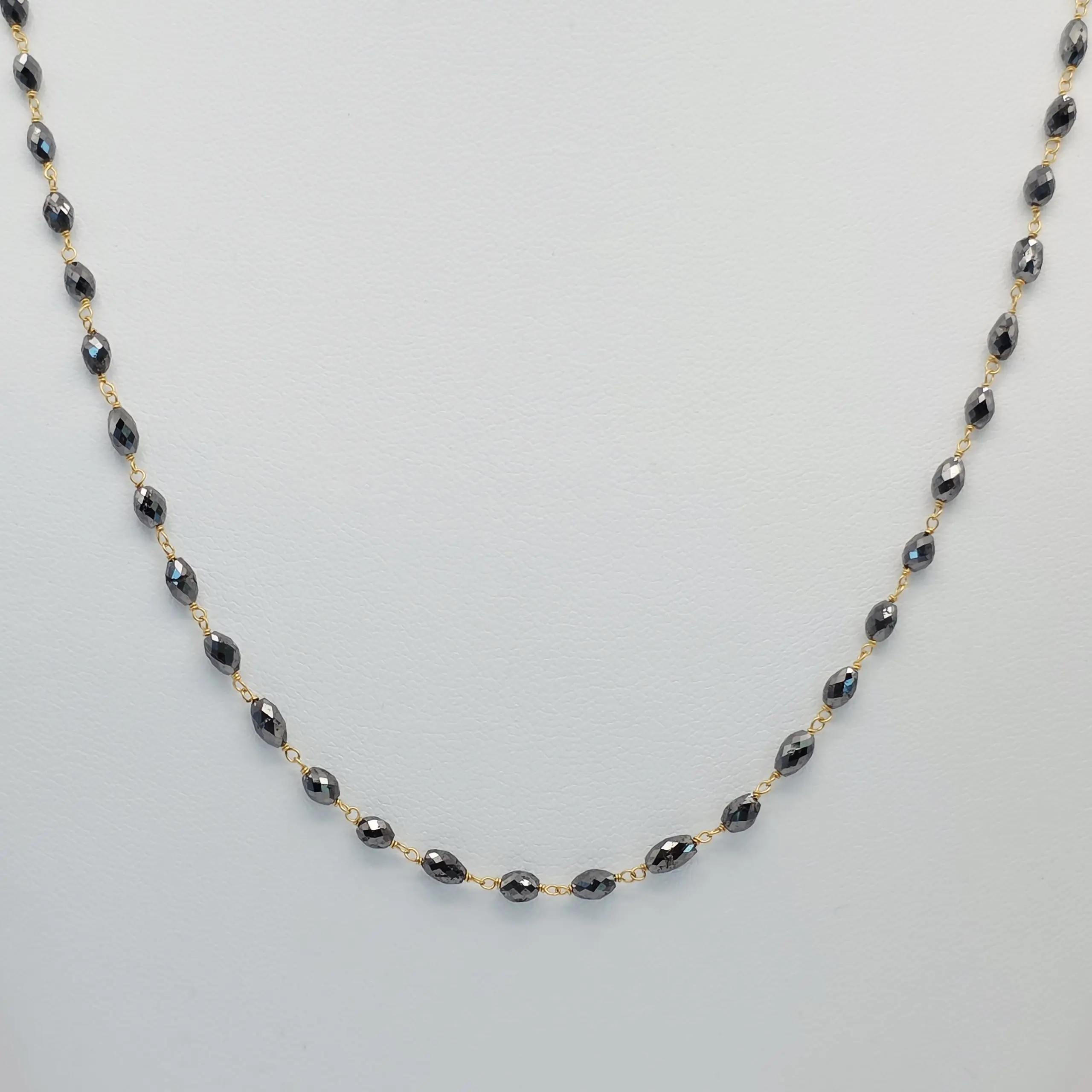 16.90 cts faceted natural black diamond marquise bead necklace in 14K yellow gold